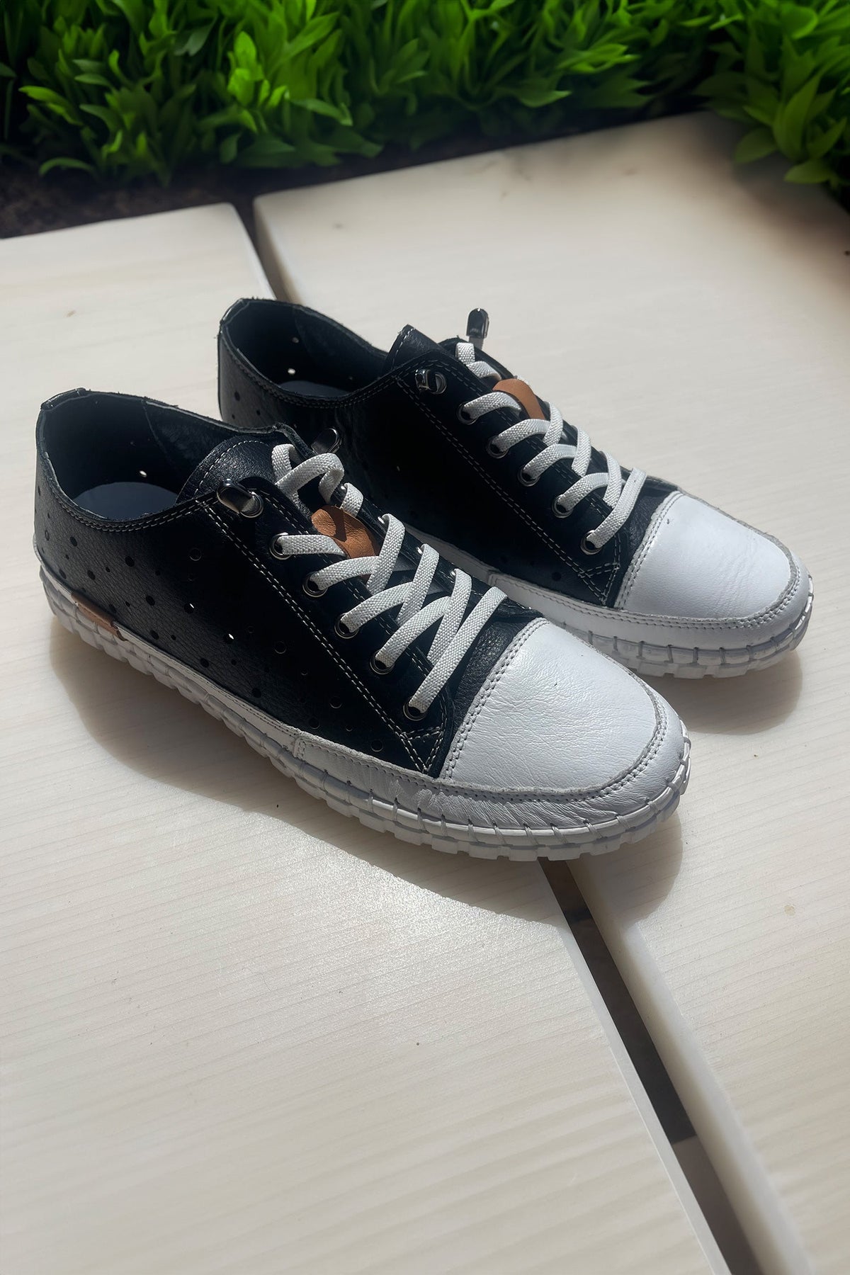 Chaser Punched Leather Sneakers in Black